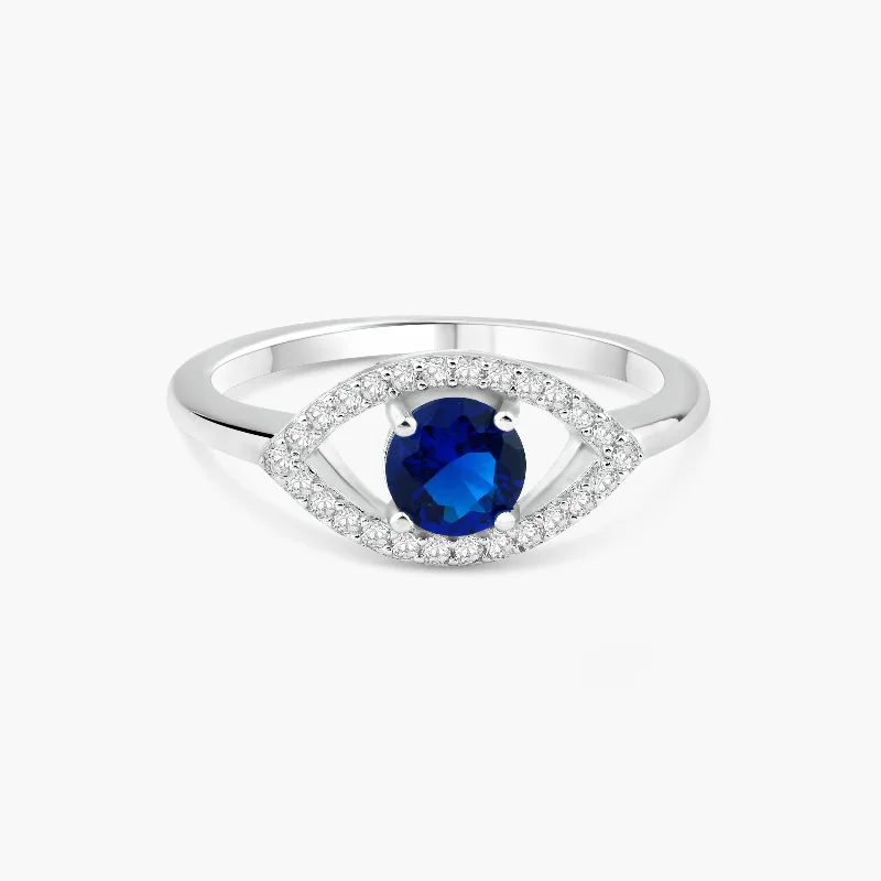 Rhodium Plated 925 Sterling Silver Open Evil Eye Ring with Blue Center Stones - BGR01360