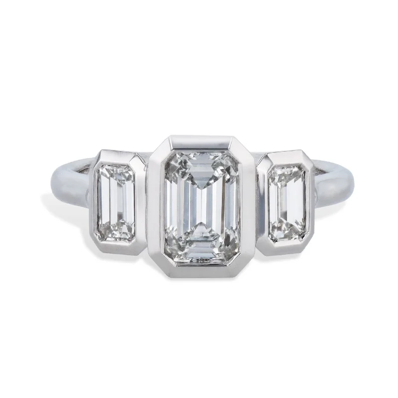 Emerald Cut three Diamond Platinum Engagement Ring